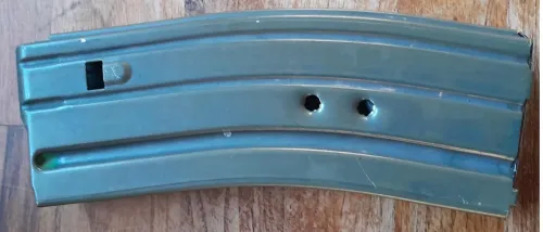 30 round M16 mag with bullet strikes 